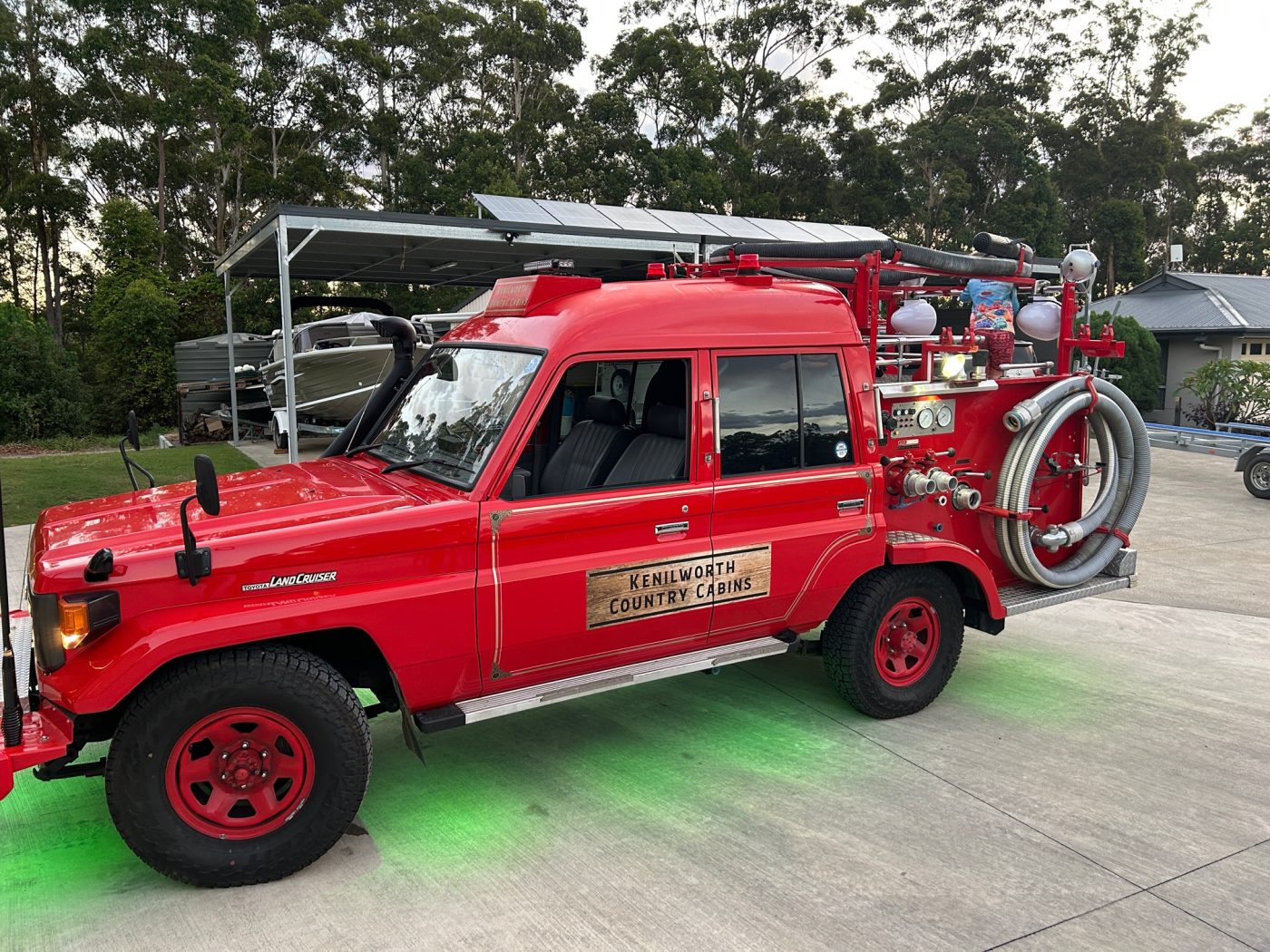 The KCC red firetruck with party lights underneath